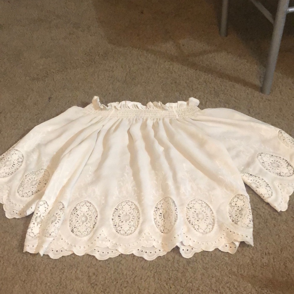 Off the shoulder, embroidered white top!
